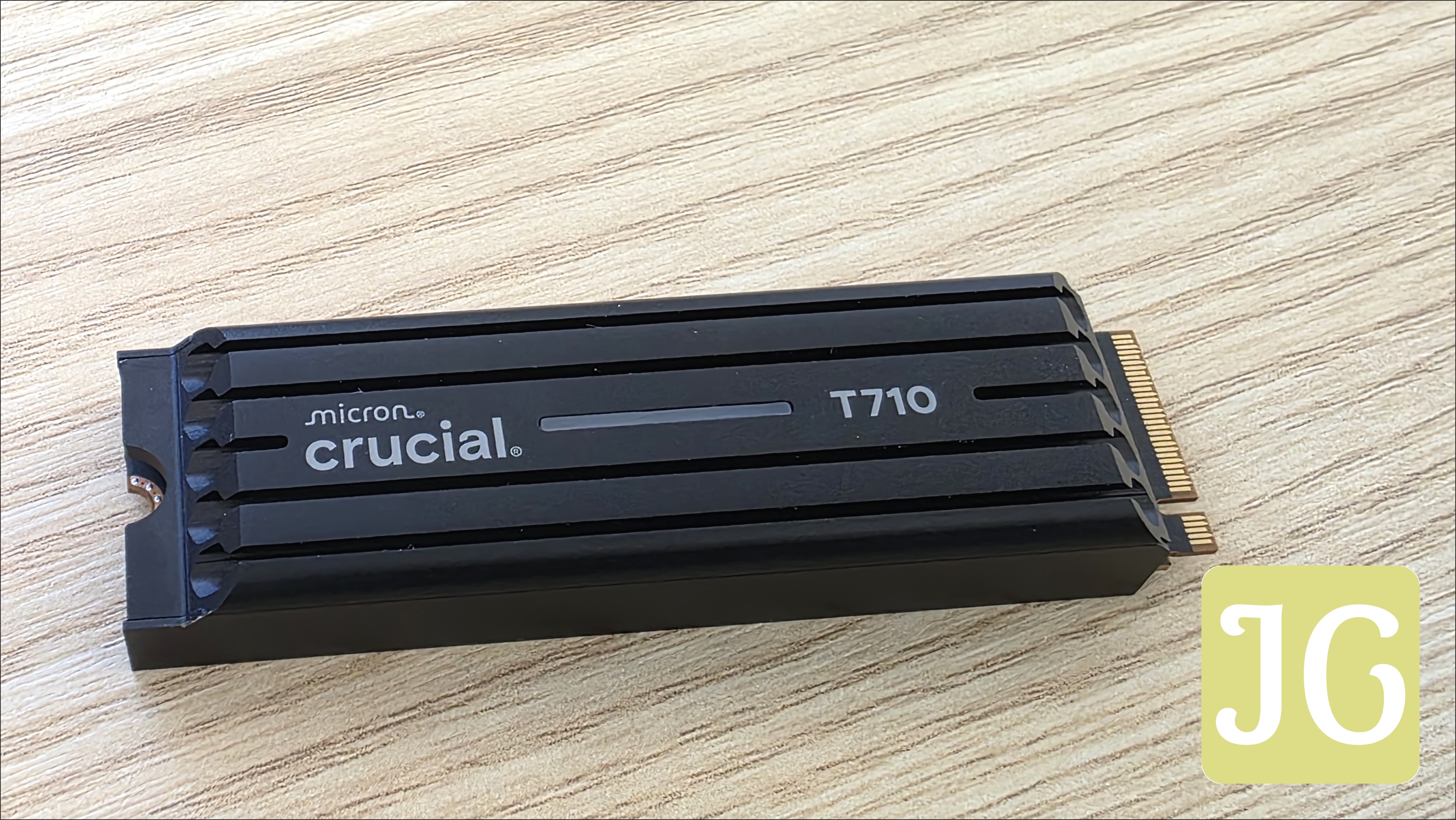 Crucial T710 SSD with its sleek, low-profile heatsink attached.