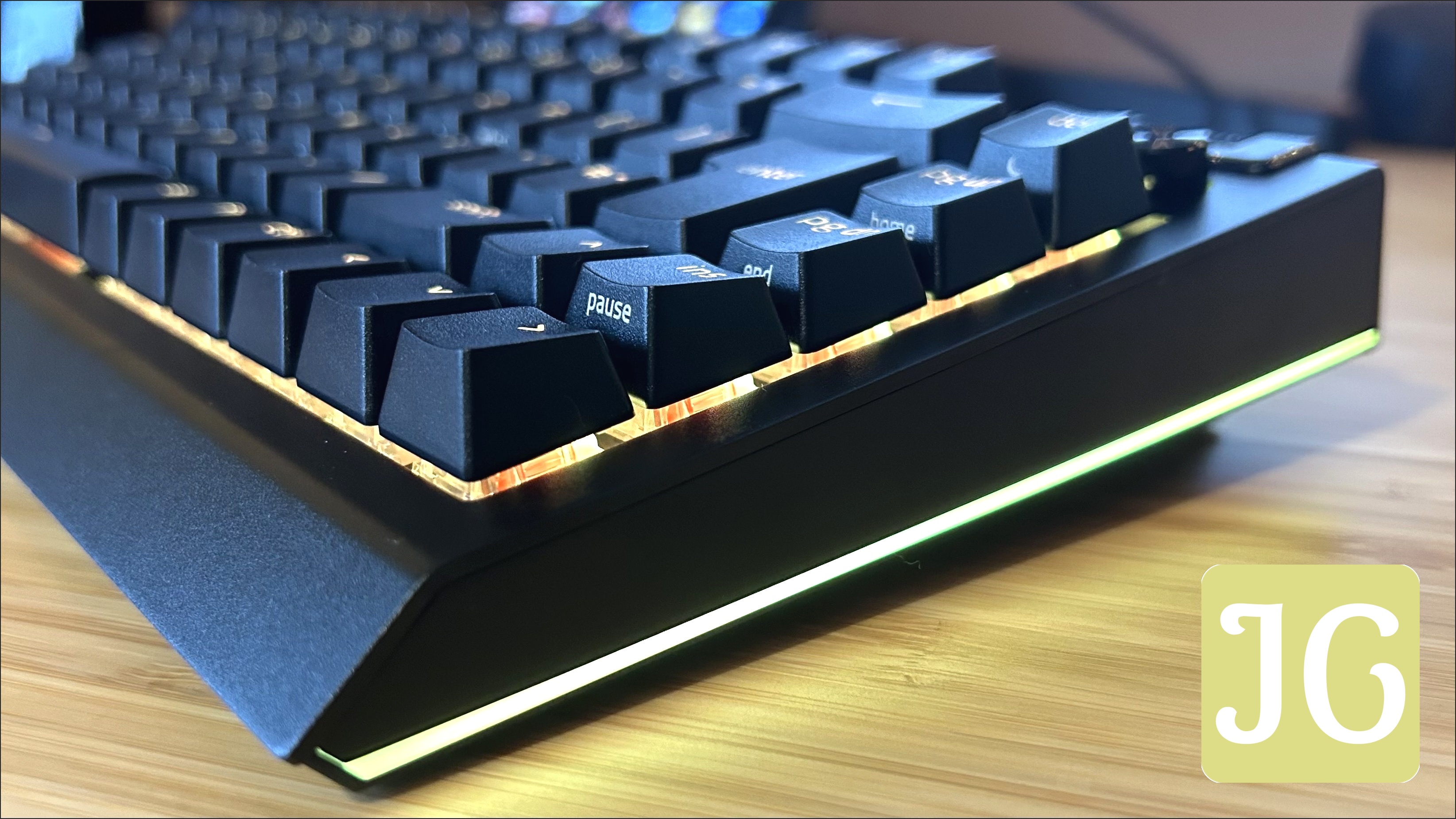 A close-up view of the luminous RGB light strip running along the side of a Razer BlackWidow V4 75% keyboard, highlighting its immersive lighting effects.