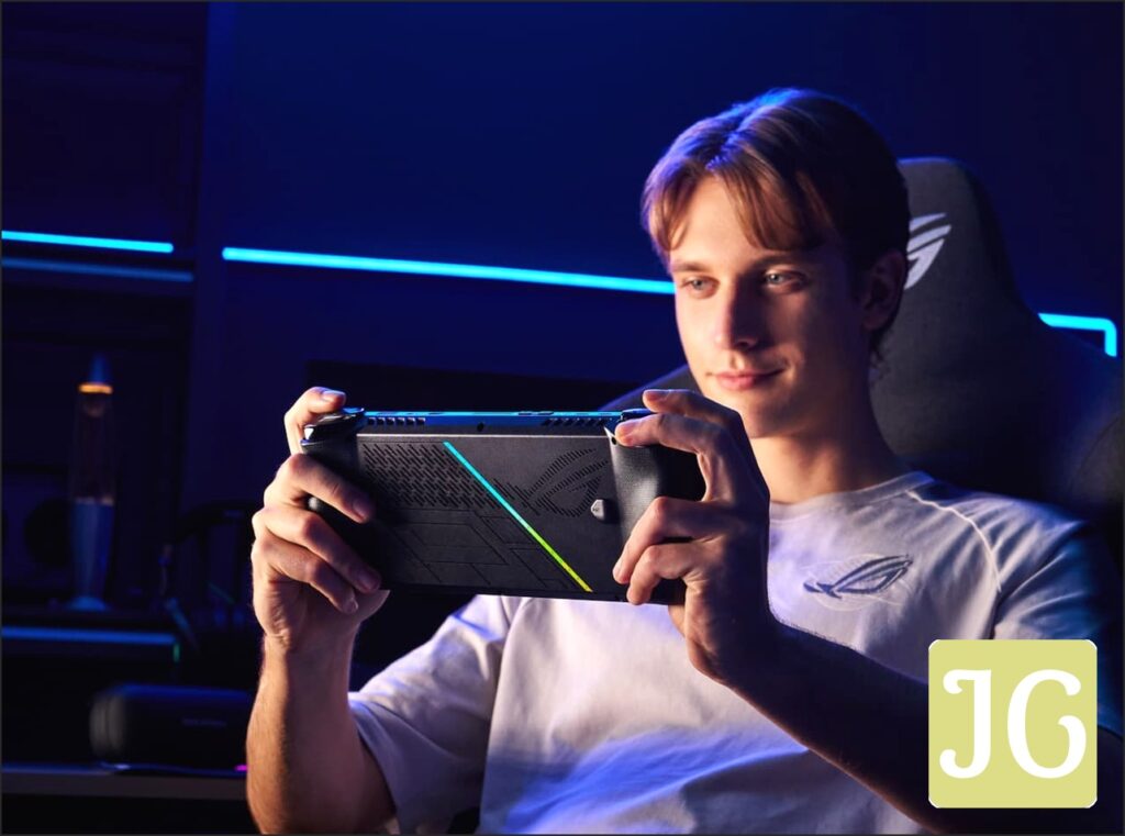 A person reclining in a computer chair in a dark room, playing with the ROG Ally X.