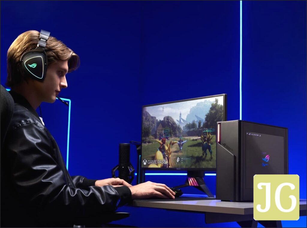 A person sitting at a desk and using an ROG desktop while wearing a headset.